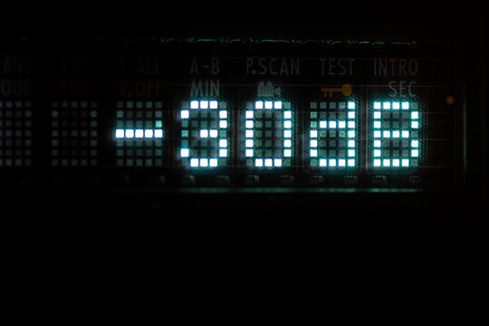 Old vacuum fluorescent display. Thirty decibel sign