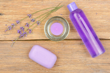 lavender spa set on wooden table.