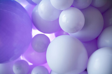 first birthday. decoration with balls. wedding decoration. children's party. birthday party. young woman decorates an evening party. Decoration for a children's party. Birthday decoration. 