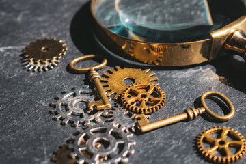 old rusty key with keyhole, old rusty key on wooden background, old watch and gears, old watch...
