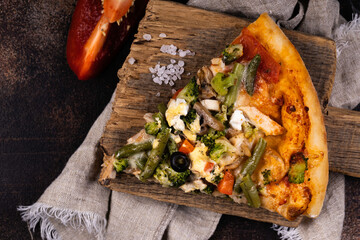 Top view of delicious and crispy pizza. American or Italian pizza. Cooking background concept.