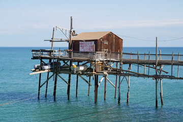 The fishing trap (trebuchet) with the words "everything will be fine". Covid - 19 - Termoli, Molise, Italy