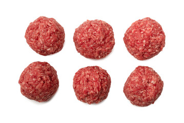 Raw meat balls isolated on white background.