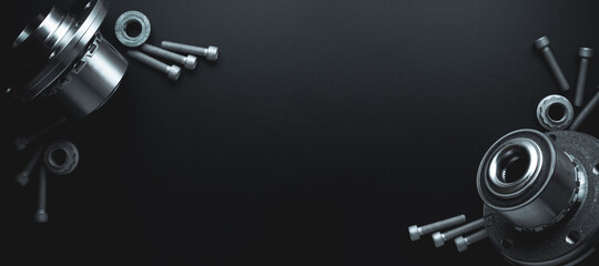 Spark plugs. Auto motor mechanic spare or automotive piece on dark banner background. Set of new metal car part. Flat lay, top view, copy space.