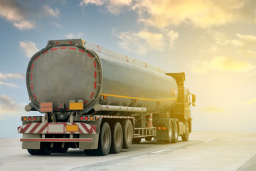 Gas Truck on highway road with tank oil  container, transportation concept.,import,export logistic industrial Transporting Land transport on the expressway with blue sky.image motion blur