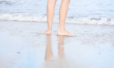 sight of a woman step running on the beach