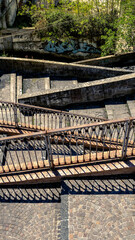 stairs and railings with graffiti and trees, Salerno, Italy