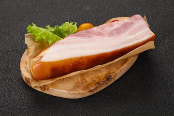 Smoked pork breast with salad leaves
