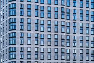 facade of a modern office residential building against the sky,