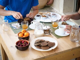 Couple eating breakfast at the table