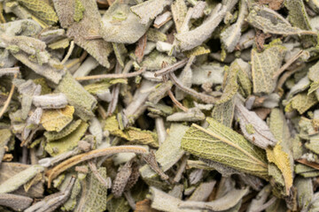 loose leaves of dry sage herb tea, top view of background and texture