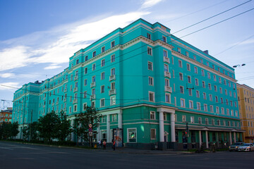 Naklejka premium The main avenue of Murmansk. Houses in the Soviet style. Russia, August 2020