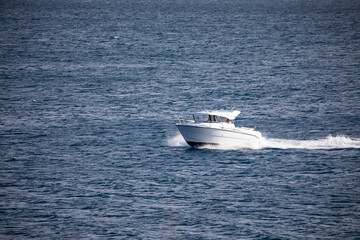 Fototapeta premium Leisure boat along the way a great spring day,Helgeland,Nordland county,Norway,scandinavia,Europe