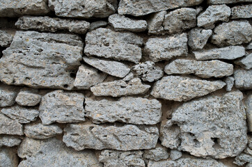 Old colorful stone wall closeup