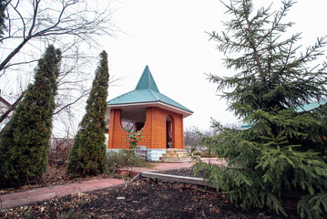 beautiful brick gazebo in the backyard