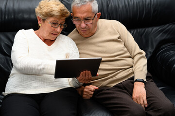 Man and woman looking at the table