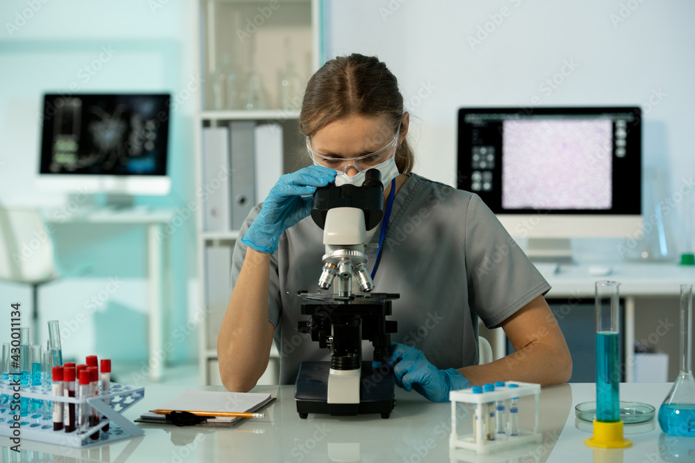 Poster busy researcher working with samples in laboratory