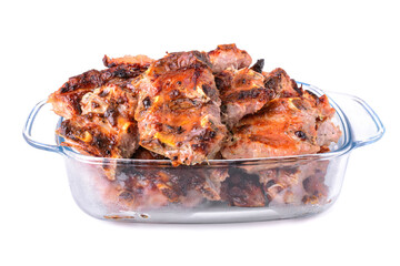 meat fried on coals in a glass cup isolated on a white background.pork ribs.selective focus.