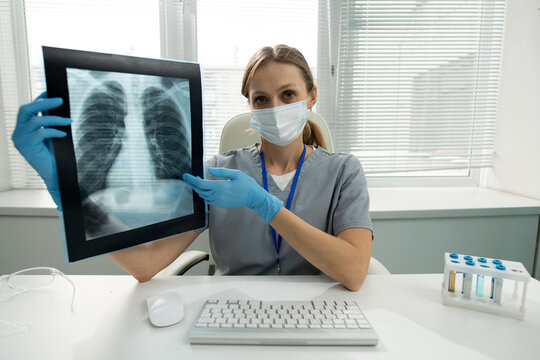 Radiologist explaining x-ray image to you