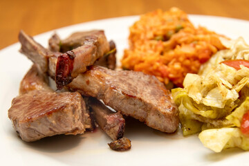 lamb chops with djuvec rice and salad