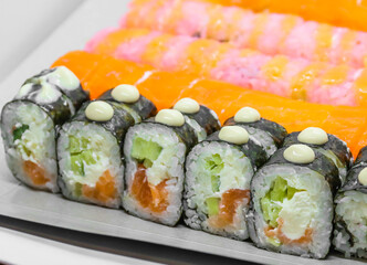 Sushi (a traditional dish of Japanese cuisine) on a white plate