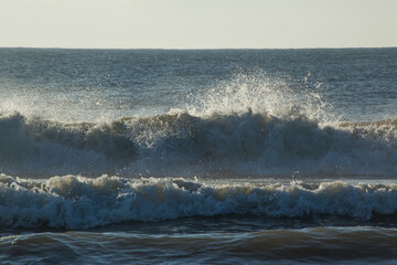 Ocean waves in the morning sunshine