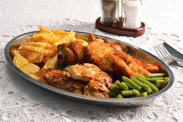 Various chicken dishes. Chicken with almonds. BBQ Chicken. Fried Chicken leg  with french fries and roasted potatoes with green beans .