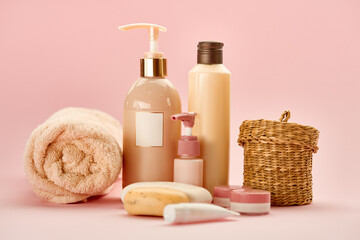 Obraz na płótnie Canvas Skin care products on pink background, nobody