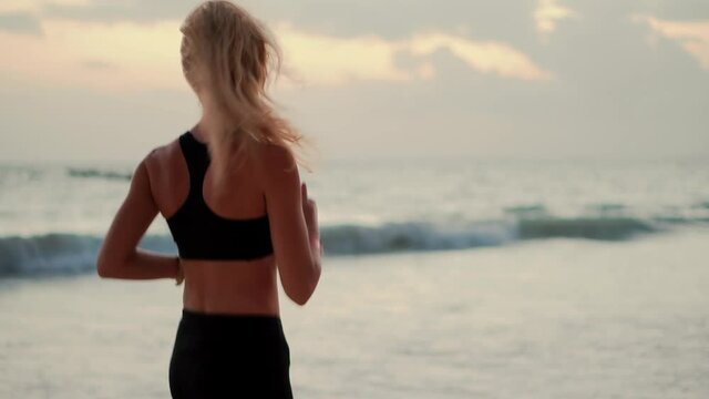 Jogging Before Triathlon Competition.Woman Run.Woman Running.Fitness Girl Running On Morining At Sea.Female Intensive Running.Exercising Runner Cardio Jogging.Fit Athlete Jogger Workout At Sunrise.