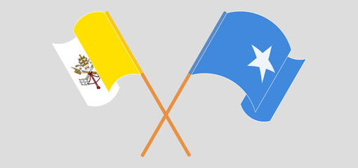 Crossed and waving flags of Vatican and Somalia