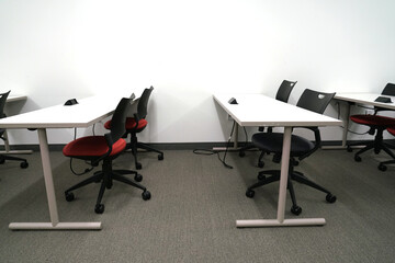rows of tables in the classroom