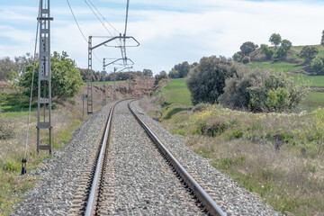 View of railroad rails with rails and catenary