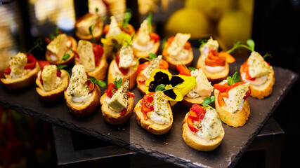 Different snacks and appetizers ready for a cocktail party. Catering concept.