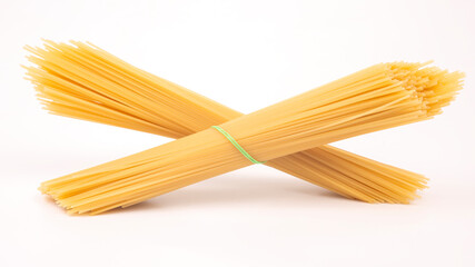 italian pasta spaghetti on a white background. flour products and food in cooking