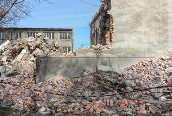 explosion, house demolition, destroyed building, broken collapsed walls, dismantling