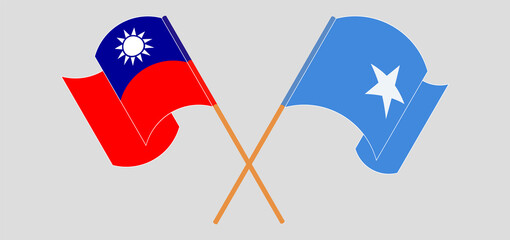 Crossed and waving flags of Taiwan and Somalia