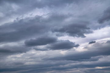 Sky with rain clouds before the storm. Background of dark clouds before a thunder-storm.