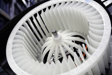 Heater fan impeller of a modern car close-up. Selected focus. Spare parts, car service.
