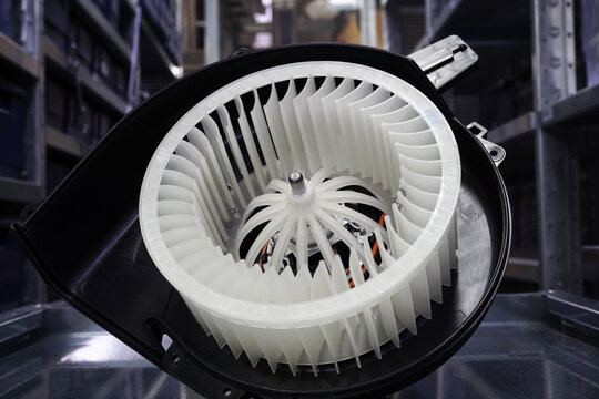 Heater fan of the air conditioning system of a modern car. Spare parts, car service.