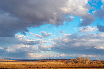 Refueling a car with fuel at a gas station.