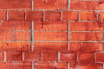 Obraz premium Bright red brick wall background. Red brick texture. Modern brickwork.