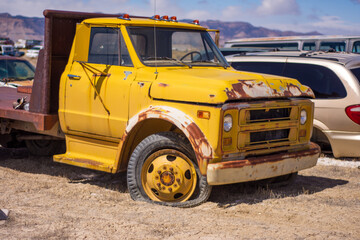 Old junked retro truck from a junk yard.