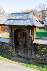 Fototapeta na wymiar Ancient wooden fence with gate from Romania 