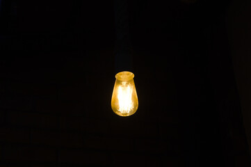 Filament lamp with yellow light