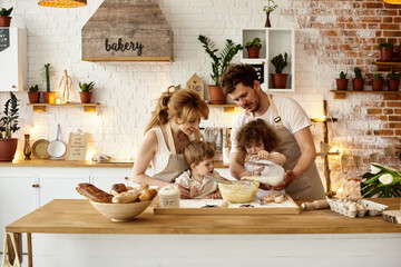 happy family cooking in the kitchen
