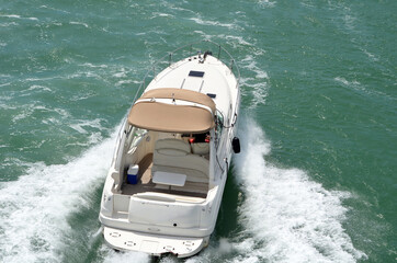 Angled overhead view of a high-end luxury cabin cruiser.