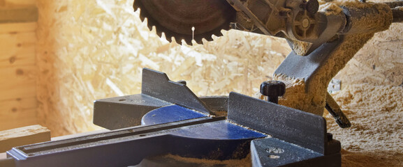 Cutting machine. A circular saw. Carpentry Works. Woodworking tools.