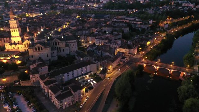 Aerial view of Perigueux city illuminated at night, Perigord Blanc, Dordogne. High quality 4k footage