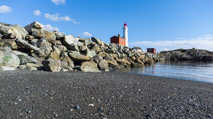Fototapeta na wymiar Lighthouse wallpaper near the ocean