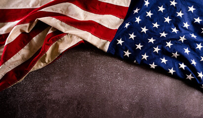 Happy memorial day concept made from american flag on dark stone background.